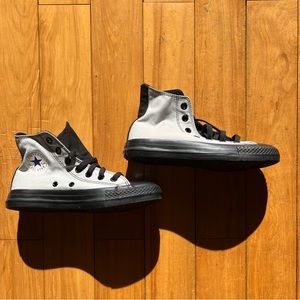 grey & black high-top Converse sneakers